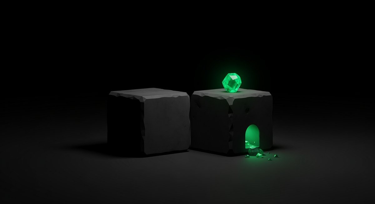 Two heavy dark stone blocks on a black floor, the left one plain and unlit and the right one holding a glowing green crystal, showing a build checked a second time by a different model